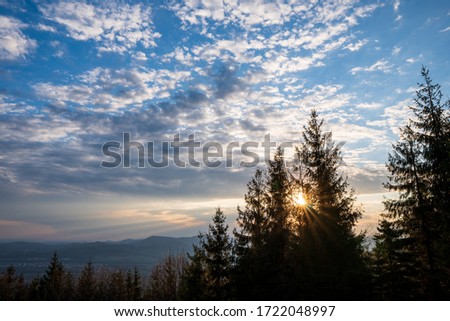 sunrise with beautiful sky and silhouette of landscape, czech beskydy