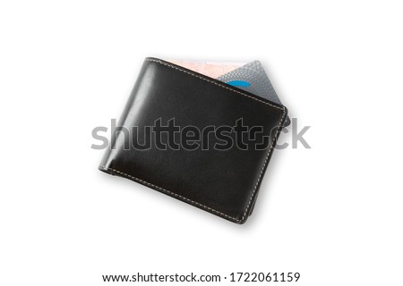 Top view of closed black genuine leather wallet with banknote and credit card inside on isolated white background with clipping path. Royalty-Free Stock Photo #1722061159