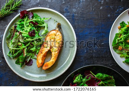 pink salmon steak fried and salad,
grilled seafood, pescatarian Menu concept food background keto or paleo diet. top view. copy space for text Royalty-Free Stock Photo #1722076165
