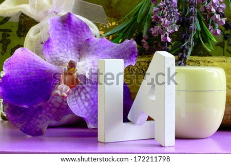 White letters and orchid