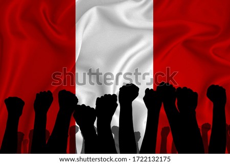 Silhouette of raised arms and clenched fists on the background of the flag of Peru. The concept of power, power, conflict. With place for your text. 
