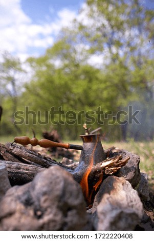 
aromatic coffee on an open fire, Tatar traditions, a drink on fire