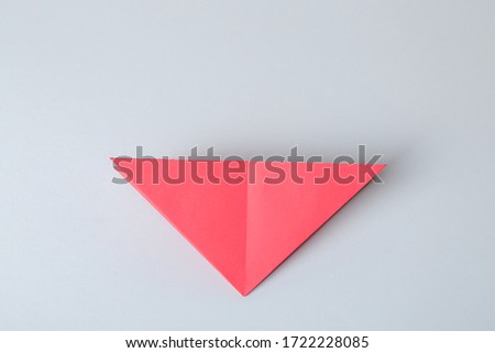 Step by step photo instruction. How to make origami paper fish. DIY for children. Children's art project craft for kids