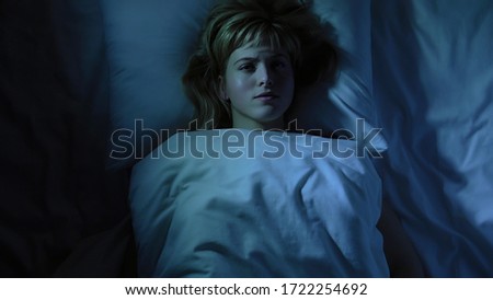 Frustrated girl cant falling asleep, thinking about her loneliness and breakup Royalty-Free Stock Photo #1722254692