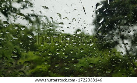 Close up view of raindrops on window, rainy day
