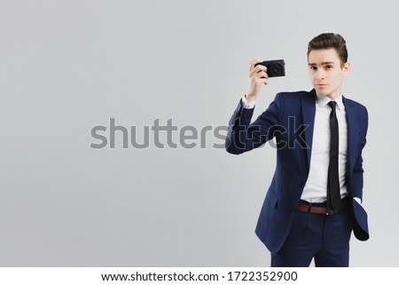 suit photographer business summit meeting head of state award press event fashion review lesson news online stream report video podcast gray background made day studio