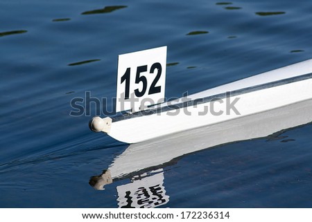 Racing boat shell competing in a competitive rowing race