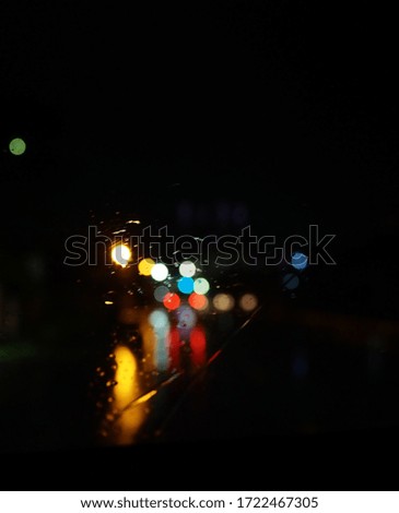 light in the night street, blurred light and background. glow, colorful and sparkle