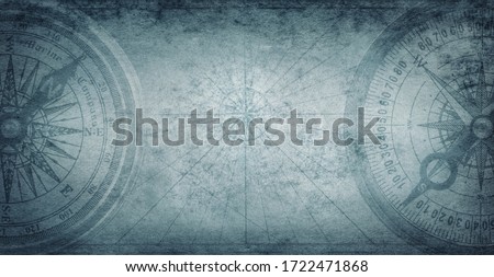 Ancient old compass on the vintage map background. Adventure, discovery, navigation, geography, education, pirate and travel theme concept background. History and geography team. Retro stale. Royalty-Free Stock Photo #1722471868