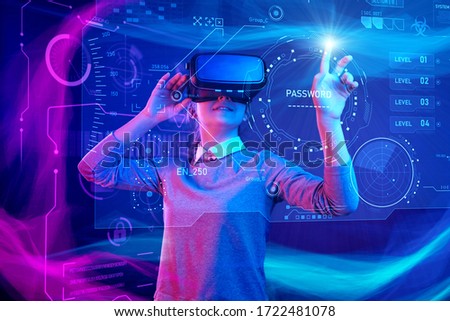 Woman with glasses of virtual reality. Future technology concept. Colorful neon lights. Royalty-Free Stock Photo #1722481078