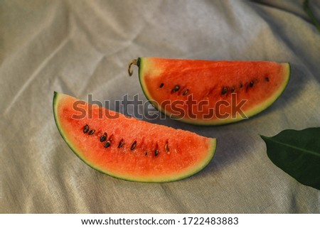 Slices of watermelon on cloth background.