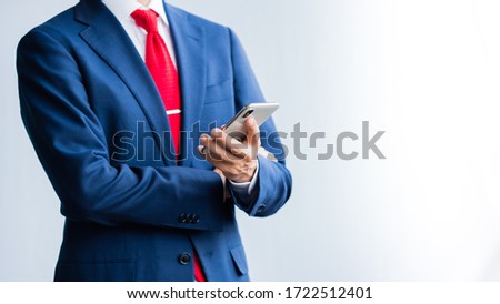 A business man using smartphone