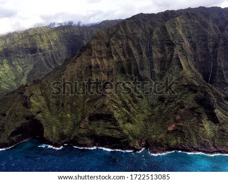 Hawaii island of Kauai Na Pali Coast scenic aerial view of volcanic cliffs and ocean