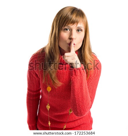 Young girl making silence gesture over isolated white background 