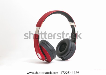 Red headphone isolate on white background. Royalty-Free Stock Photo #1722544429