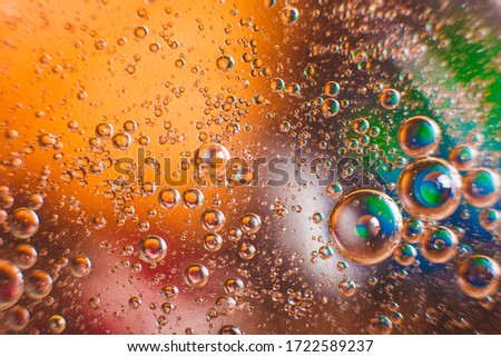 macro photography of colored bubbles in the water. macro effect 3D texture