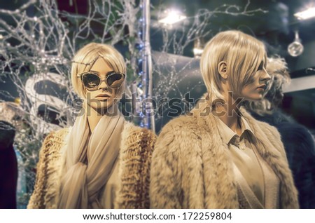Street mannequin in shop window