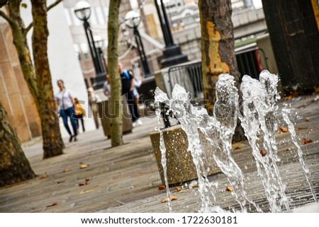Detail image of a fountain along the banks of the Thames, in central London.
