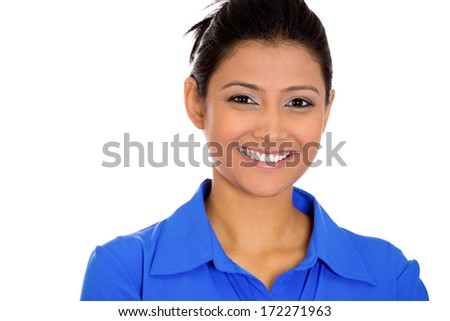 Closeup head shot portrait of confident smiling happy pretty young woman wearing blue shirt, isolated on white background. Positive expression facial expression feelings, attitude, perception