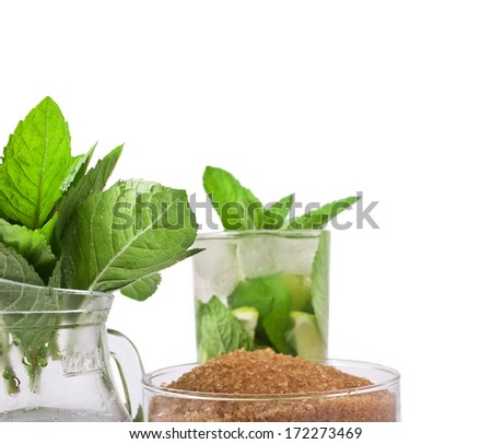 Cocktail mojito with ingredients isolated on white background 
