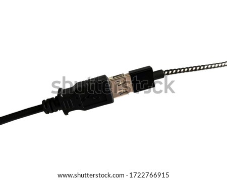 Connected black usb extension cable isolated on white background.   Selective focus. 