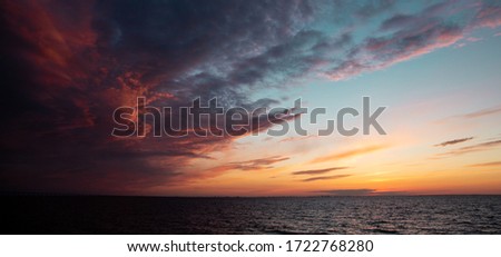 Picture of a blue horizon with clouds