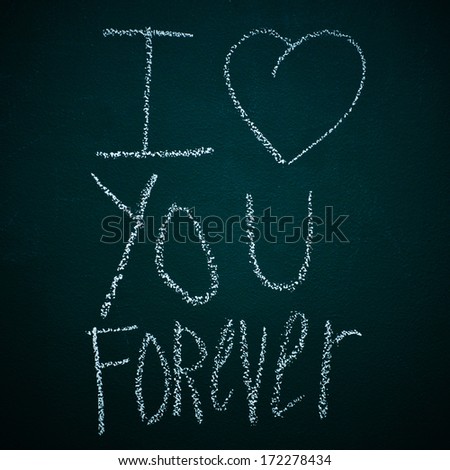 sentence I love you forever written with chalk in a chalkboard