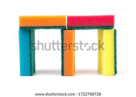 Multicolored sponges for cleaning, isolated on white background. Sponges for dishwashing