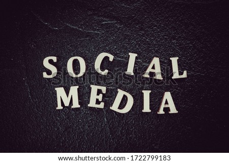 Social media text written on black background