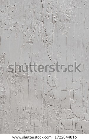 High resolution close-up of off-white distressed plaster background