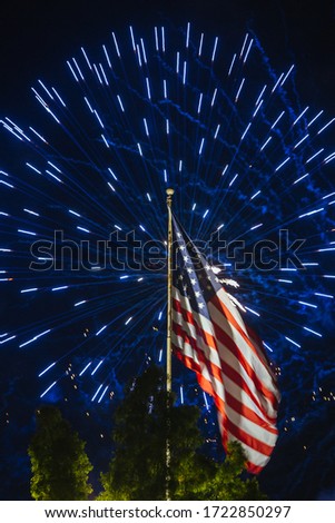 A bright, loud fireworks display on the 4th of July for Independance Day in Los Angeles, California, USA Royalty-Free Stock Photo #1722850297