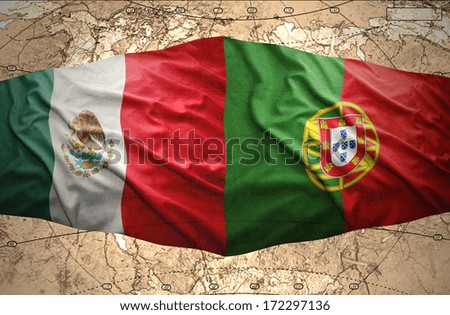 Waving Mexican and Portuguese flags on the of the political map of the world
