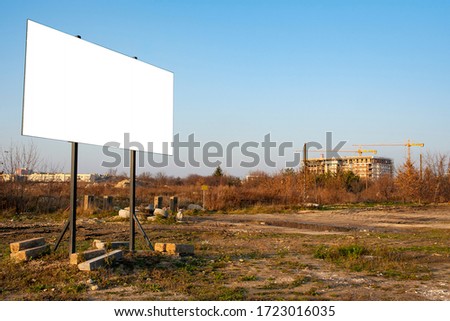 Blank white advgertising billboards on the construction site