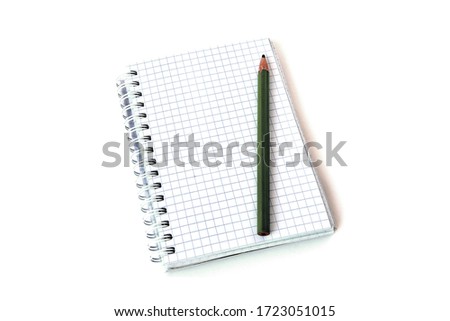 Squared notebook with pencil on isolate white background Royalty-Free Stock Photo #1723051015