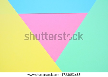 Beautiful pastel abstract trend background with yellow, mint, blue and pink (dusty rose). Light texture, blank. Flat lay, top view, copy space.
