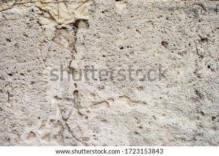 Light texture of old antique wall, layer of concrete wall plaster. Great for design and texture background.
