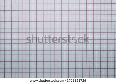 Checkered paper background. square grid surface. crossing red lines