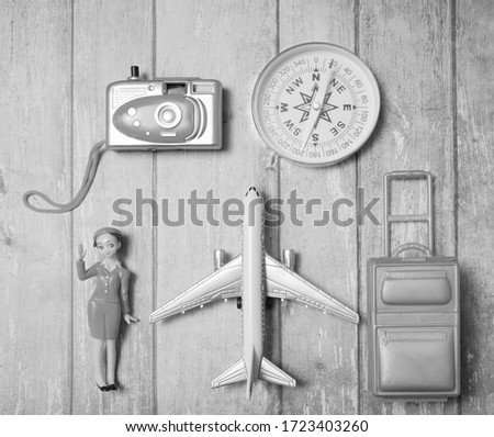 set of objects for travel isolated on bluу wooden background. 