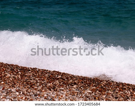 the sea wave and the beautiful beach as a place of active recreation