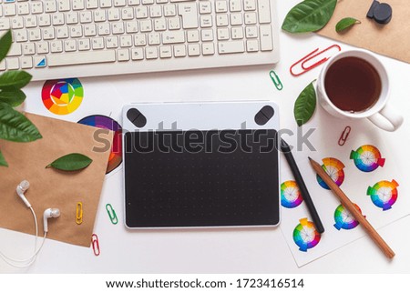 Designer's desktop with a graphic tablet