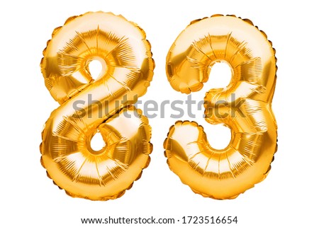 Number 83 eighty three made of golden inflatable balloons isolated on white. Helium balloons, gold foil numbers. Party decoration, anniversary sign for holidays, celebration, birthday, carnival