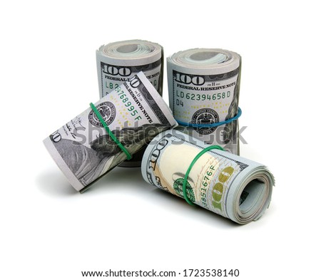 A large roll of hundred dollar bills knitted by a  rubber band isolated on white background 