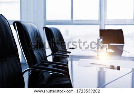 White paper with pen in meeting room. Royalty-Free Stock Photo #1723539202