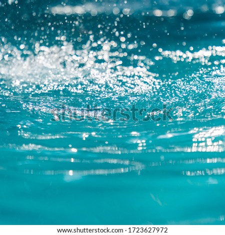 Bokeh light background in the pool,Water In Swimming Pool Texture Background