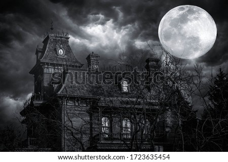 In a stormy weather. Old american type wooden house. Horror house Royalty-Free Stock Photo #1723635454