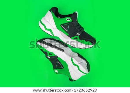 Pair of fashion colorful sneaker shoe on a blue isolated background
Fitness sneakers shoes for training, running shoe. Sport shoes.
Fashion black sneaker, daddy shoe, ugly shoe, street fashion.