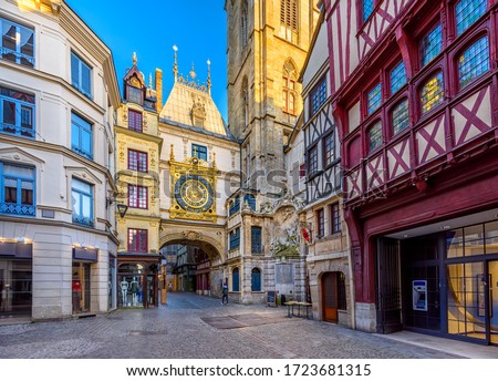 The Gros-Horloge (Great-Clock) is a fourteenth-century astronomical clock in Rouen, Normandy, France. Architecture and landmarks of Rouen. Cozy cityscape of Rouen Royalty-Free Stock Photo #1723681315