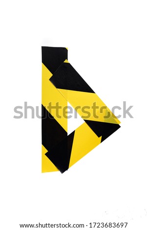 Letter D from yellow and black warning tape isolated on white background. Caution lines. Danger and risk sticky tape. Police stripe line. Industrial protection