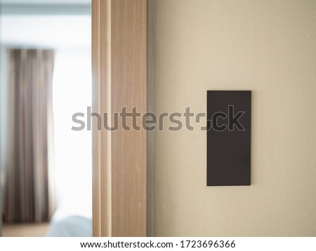 Hotel room with room number sign