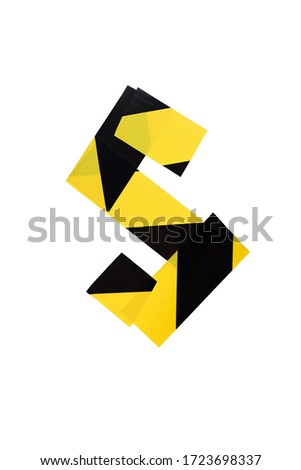 Letter S from yellow and black warning tape isolated on white background. Caution lines. Danger and risk sticky tape. Police stripe line. Industrial protection